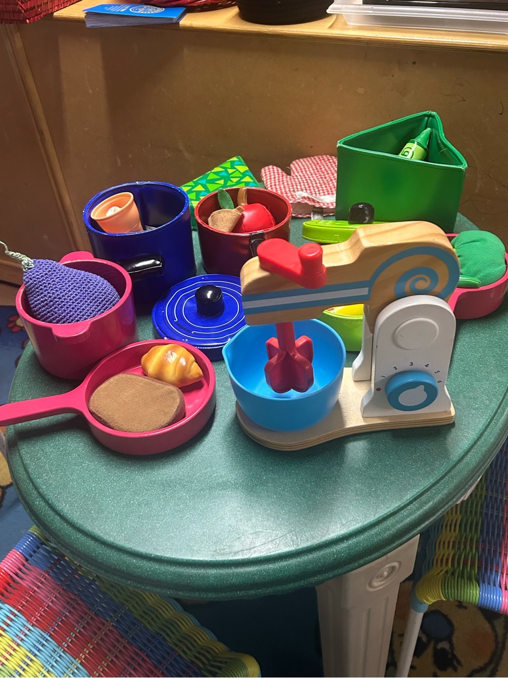 Kitchen play- colorful pans, food and wooden mixer